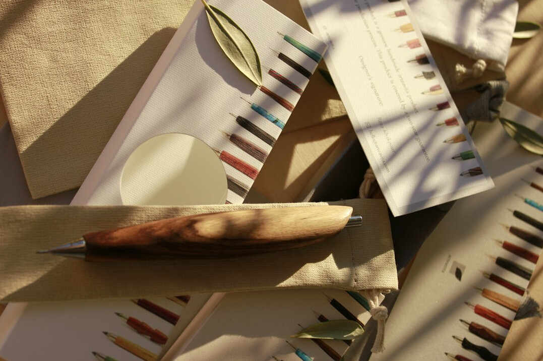 Stack of sealed envelopes and an old fountain pen