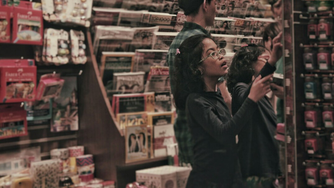 store detective watching shopper