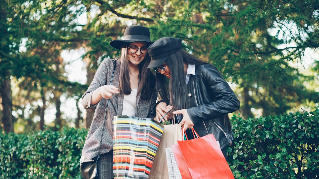 woman hiding item in bag